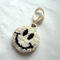 Beige Zwarte Smiley Speenhanger